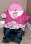 diaper baby wearing cute pink shirt and jeans