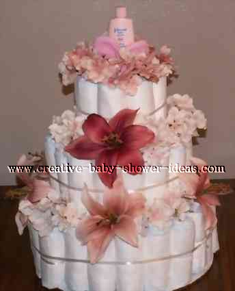 maroon and pink flowers diaper cake