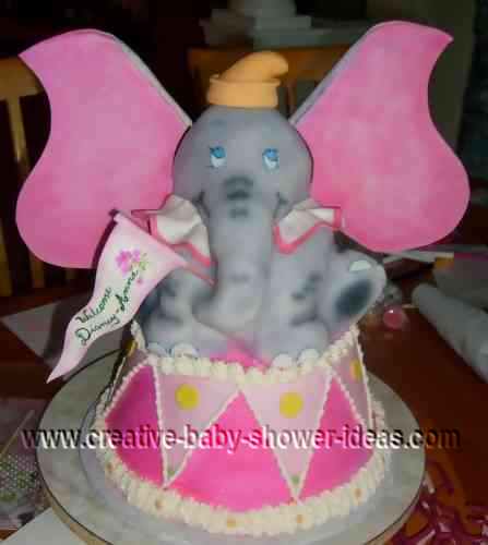 dumbo elephant baby shower cake with flag and drum