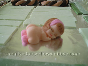 making the fondant babies for the basket cake