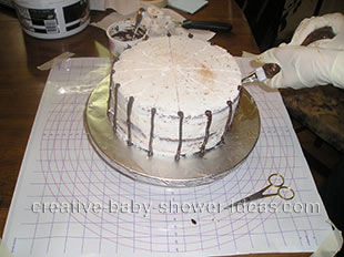 making the structure of the basket baby cake 