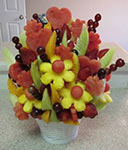 eldible fruit bouquet with watermelon pinneaple grapes honeydew and cantaloupe