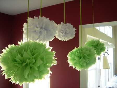 green tissue pom poms