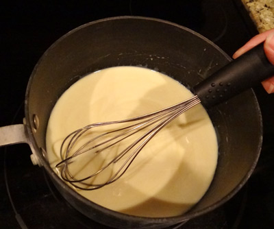 heavy whipping cream and condensed milk in the pan