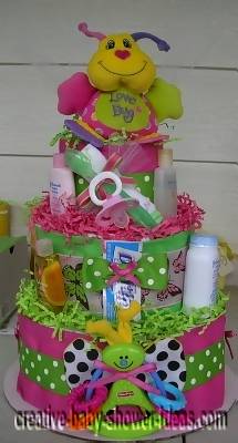 pink and green lovebug diaper cake centerpiece