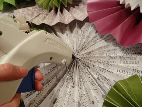 hot gluing paper rosettes together