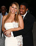 Mariah Carey and husband smiling happily