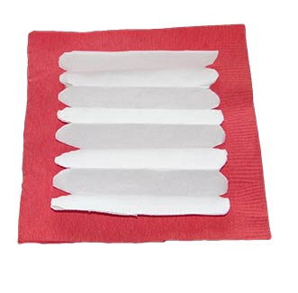 red and white napkins with middle napkin accordion folded and cut