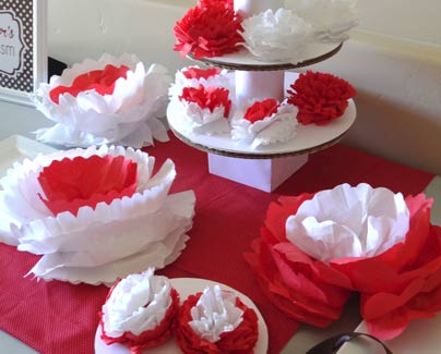 large assortment of large and small paper flowers