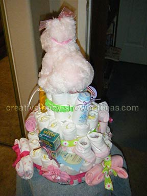 back of pink hippo nappy cake