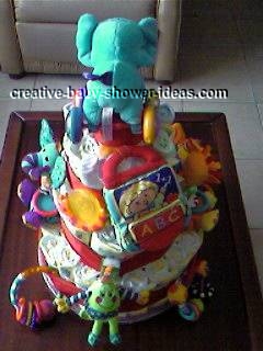 back of colorful animals diaper cake