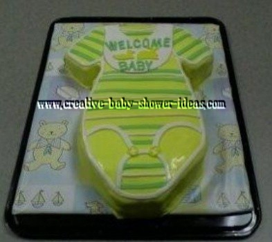 yellow green and white onesie cake