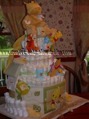 another view of winnie the pooh diaper cake showing blankets
