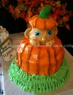 side view pumpkin baby shower cake with a sign that says pumpkin jr