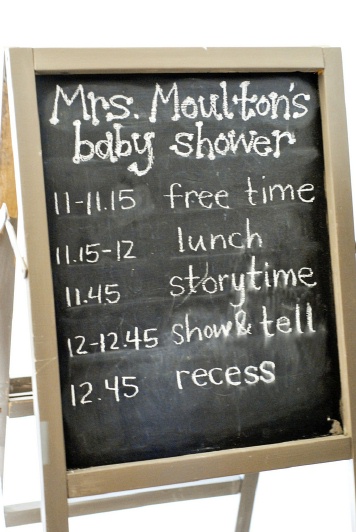 school baby shower sign She hung blue tissue pom poms as a pretty and soft school baby shower sign She hung blue tissue pom poms as a pretty and soft