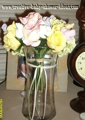 side view of sock rose bouquet in a vase