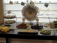 book baby shower food table with book wreath centerpiece