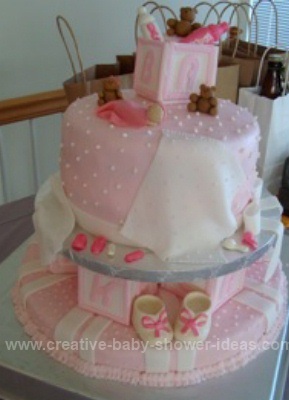 pink blanket tier blocks cake