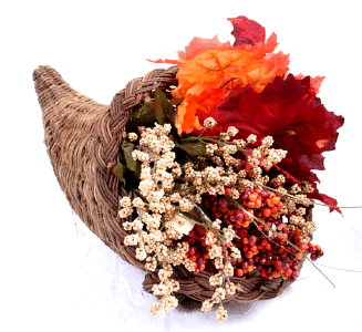 cornucopia with harvest flowers and fall leaves