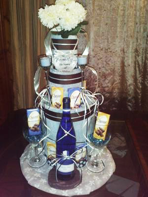 tiffany blue wedding towel cake with wine and glasses