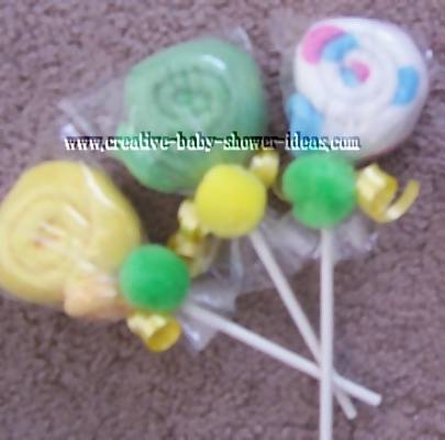 yellow green and blue washcloth lollipops
