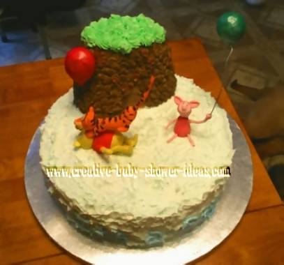 winnie the pooh baby cake with big tree and characters