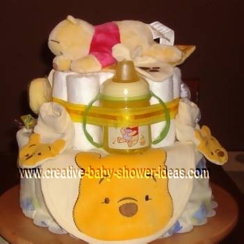 winnie the pooh diaper cake with baby items