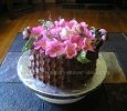 chocolate basketweave cake filled with pink flowers