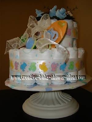 right side of baby bootie cake with baby sock roses