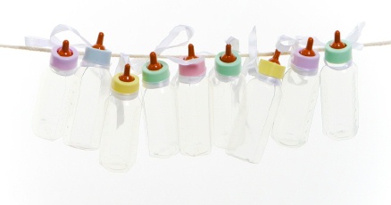 colorful baby bottles on a clothesline