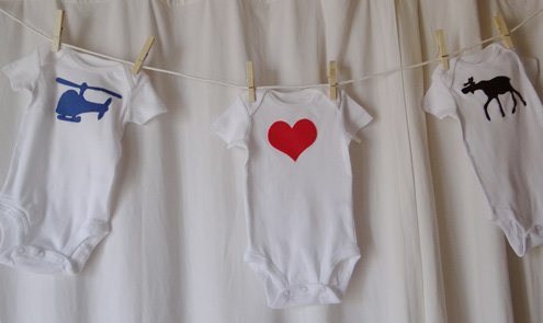 baby shower clothesline with cute onesies
