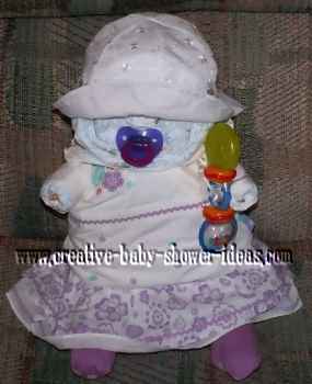diaper baby in cute purple and white summer dress