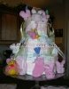 pink and white bunny diaper cake with washcloth bunnies and organza ribbon