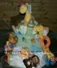 green and blue blanket covered diaper cake with jungle animals