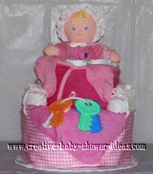 pink doll diaper cake