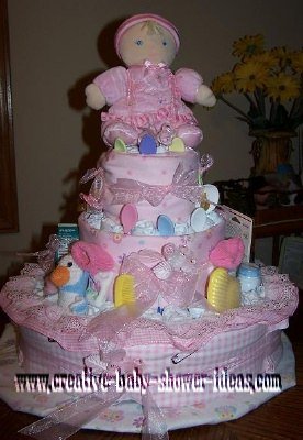 light pink girl doll diaper cake