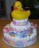 large 3 layer diaper cake with huge rubber ducky on top