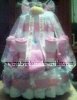 pink monkey diaper cake wrapped with white tulle