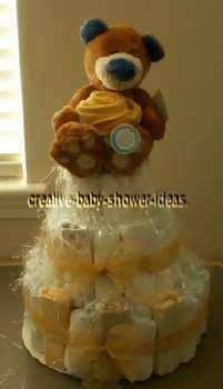 teddy bear with golden roses diaper cake