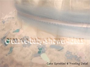 closeup of side of diaper cake with baby confetti