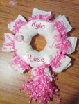 pink and white girl diaper wreath