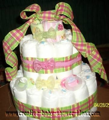 pink and green plaid frog diaper cake