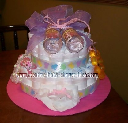 baby bottle diaper cake pink and purple bottles girl diaper cake
