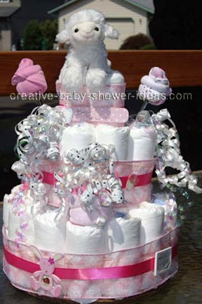 white lamb and washcloth roses girl diaper cake