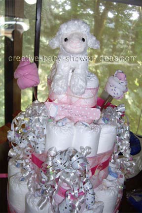 white lamb cake closeup of girl lamb diaper cake