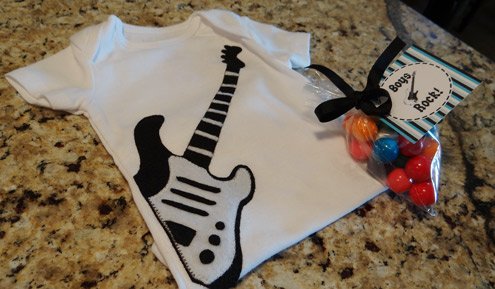 black and white guitar onesie