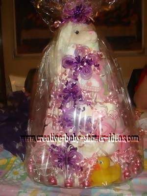 lamb Diaper Cake pink and purple lamb diaper cake wrapped in celophane