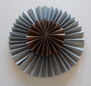 large and small paper rosette layered together