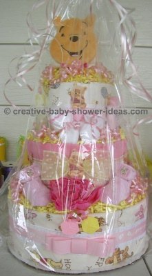 wrapped pink winnie the pooh diaper cake