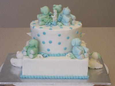 side view of blue teddy bear cake